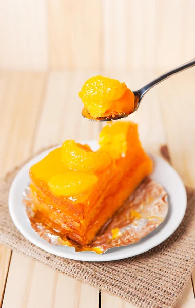 Close up orange fruit cake — Stock Photo, Image