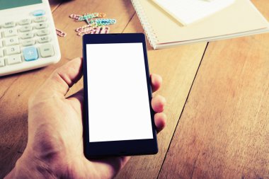 Elini adam akıllı telefon vintage tarzı holding