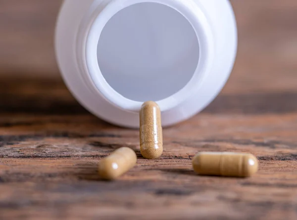 Pill Spilling Out Bottle Blurred Background Medicine Capsule Health Vitamin — Stock Photo, Image