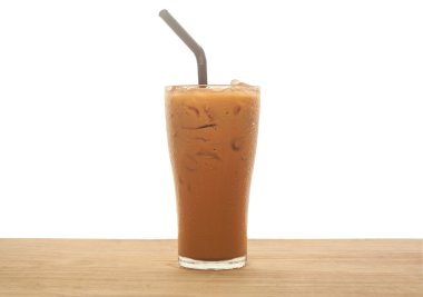 Ice tea on wood isolated