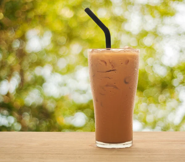 Ice tea on wood with morning light