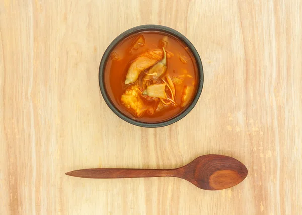 Spicy sour soup vegetable on wooden background — Stock Photo, Image