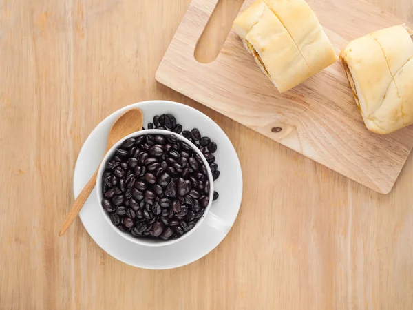 Fresh black coffee in a white cup of coffee with bread cut — Stock Photo, Image