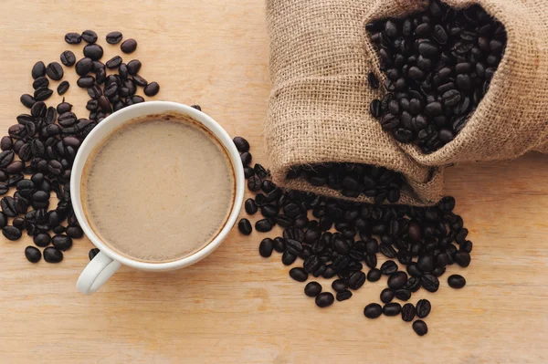 Espresso in a cup of coffee with roasted coffee, Top view — Stock Photo, Image