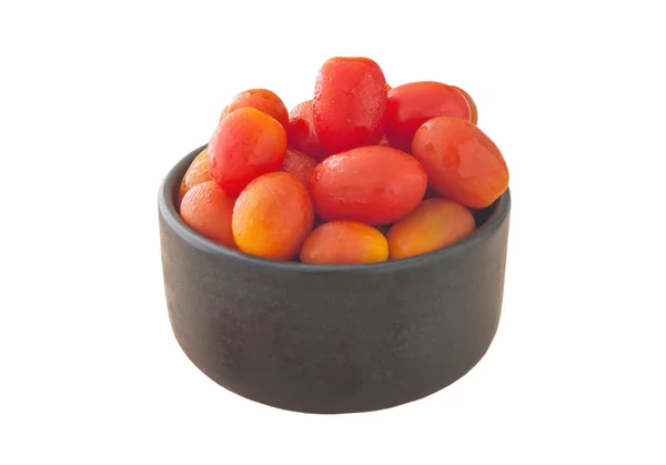 Tomoto fruit in a black bowl isolated, Clipping path — Stock Photo, Image