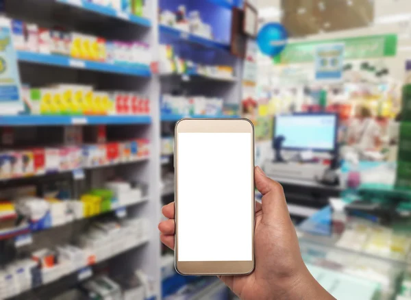 El ile smartphone üzerinde bulanık içinde eczane