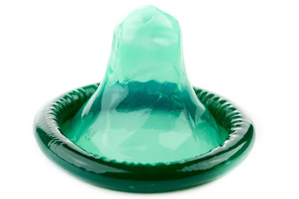 Зелений презерватив — стокове фото