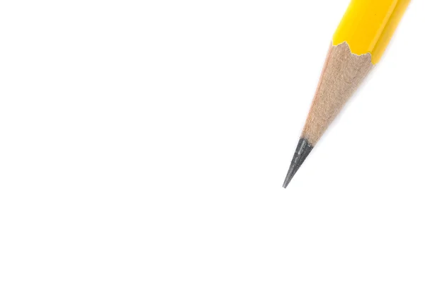 Желтый карандаш на белом фоне — стоковое фото