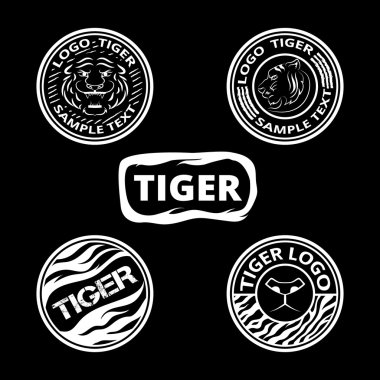 Set of logos with tigers, striped icons and lagels. Graphic roun clipart