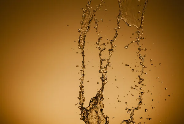 ゴールド背景の水の質感 — ストック写真