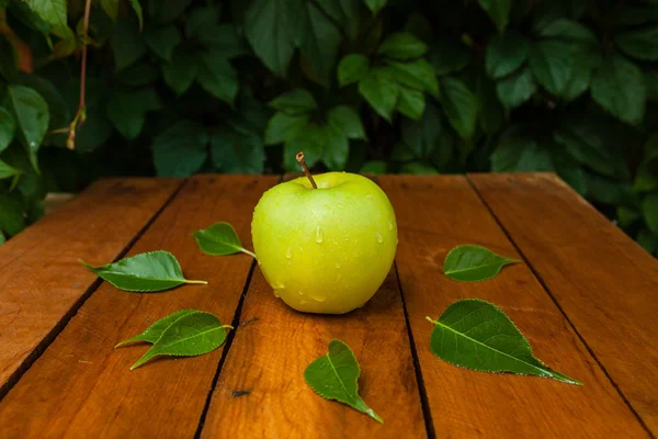 Green apple in the village — Stock Photo, Image