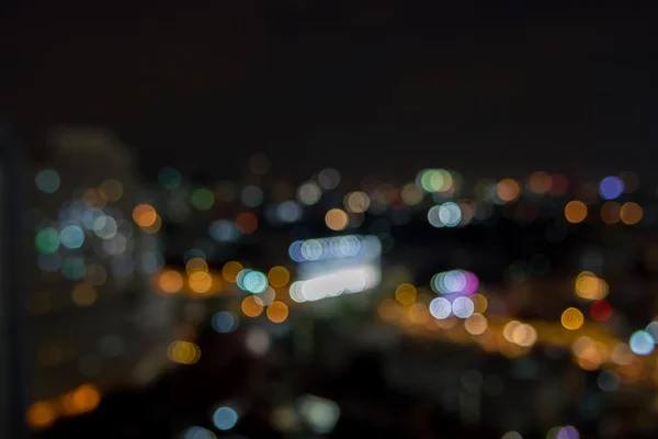 Abstracte stedelijke nacht licht defocus achtergrond — Stockfoto