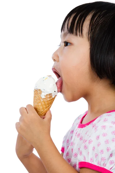 Asian Little Chinese Girl Eating Ice Cream Royalty Free Stock Photos