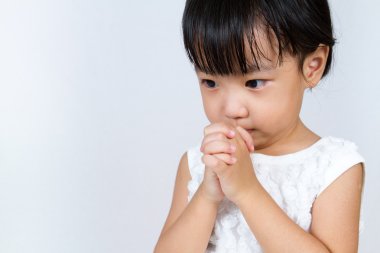 Asian Little Chinese Girl Praying clipart