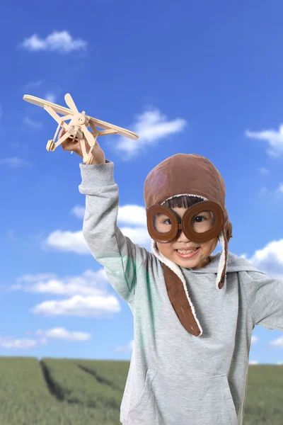 Asian Little Chinese Girl Playing with Toy Airplane