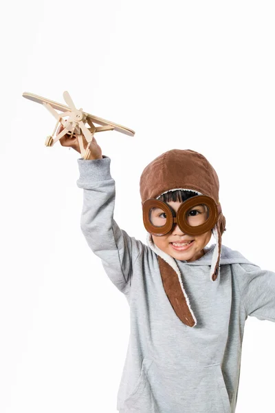 Asiático poco china chica jugando con juguete avión — Foto de Stock