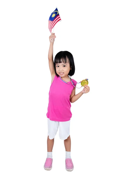 Asian Chinese little girl holding Malaysia Flag with gold medal — Stock Photo, Image
