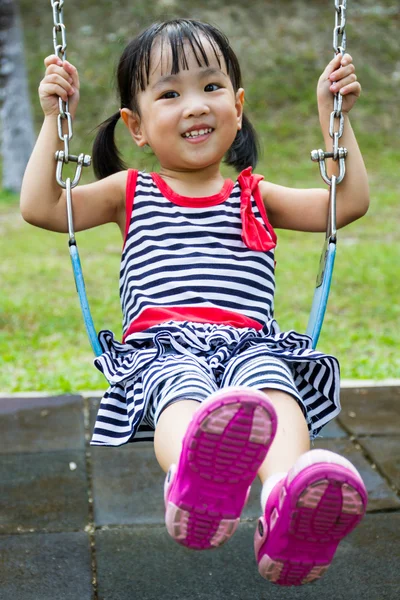 Asian Kid Swing At Park — Stock Photo, Image