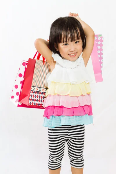 Asiatisches Kind mit Einkaufstasche — Stockfoto