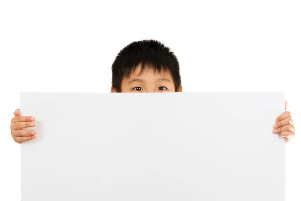 中国のアジア子供の保持している空白のホワイト ボード. — ストック写真
