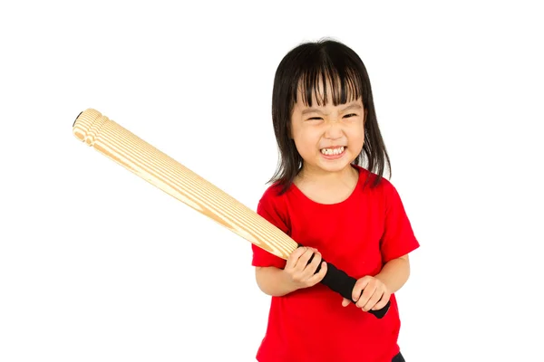 Chinese little girl holding baseball bat with angry expression — Stock Photo, Image