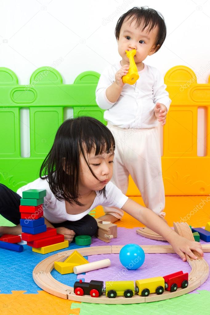 Asian Chinese childrens playing with blocks