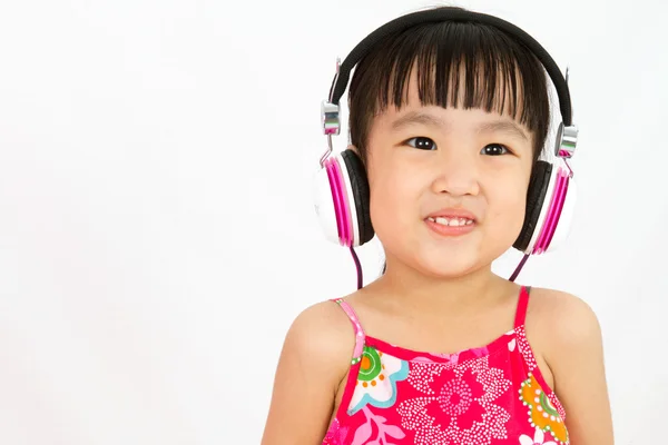 Chiński dziewczynka na słuchawki — Zdjęcie stockowe