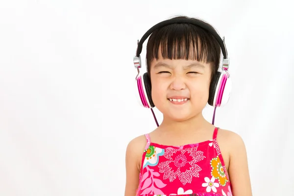 Chiński dziewczynka na słuchawki — Zdjęcie stockowe