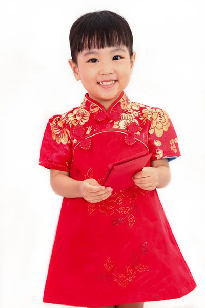 Niña china sosteniendo sobre rojo —  Fotos de Stock