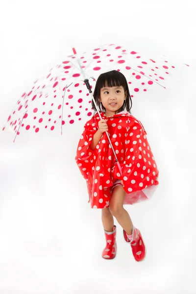Chinese Little Girl Holding umbrella with raincoat — Stock Photo, Image