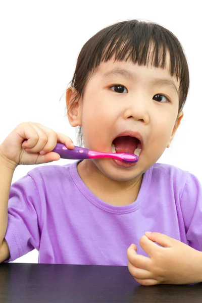 Chinese little girl brushing teeth — Stock Photo, Image