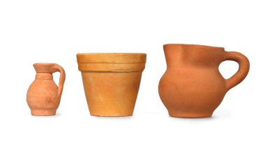 Terracotta pot and jugs isolated on white background