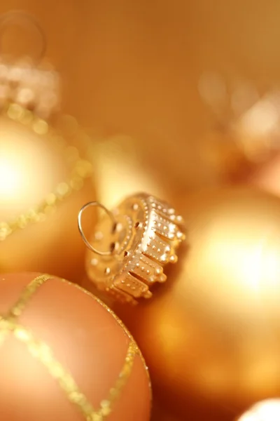Beautiful gold christmas baubles — Stock Photo, Image