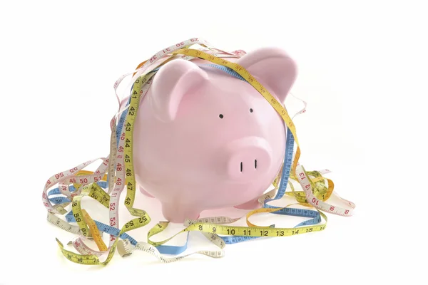 Piggy Bank and measuring tape — Stock Photo, Image