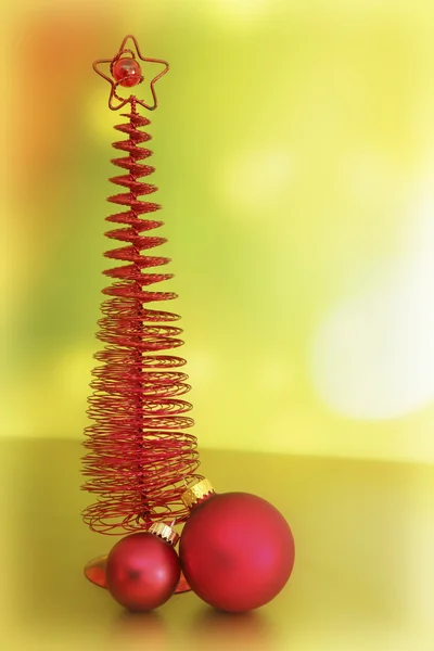 Faux Christmas tree with christmas baubles — Stock Photo, Image