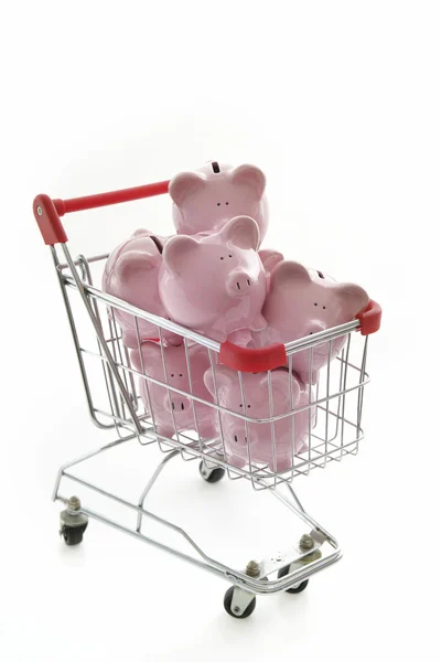 Bancos porquinhos no carrinho de compras — Fotografia de Stock