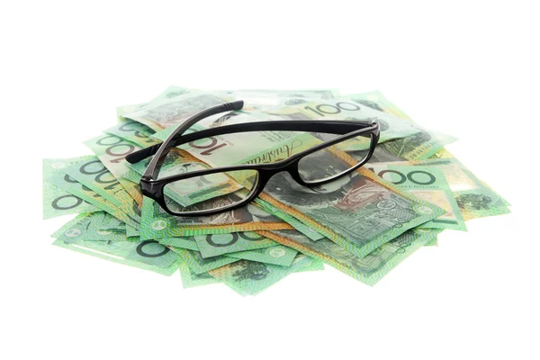 Australian money and eyeglasses — Stock Photo, Image