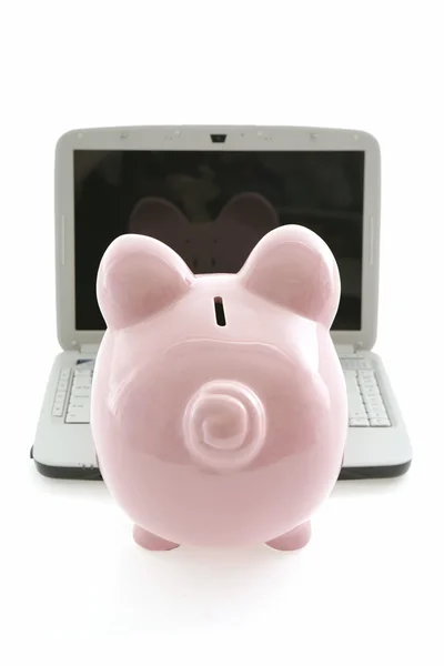 Banco porquinho e laptop — Fotografia de Stock