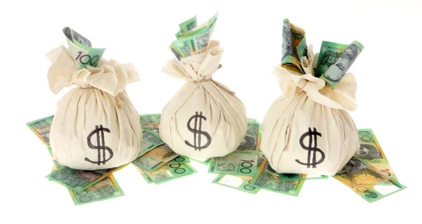 Dinheiro Australiano com sacos de dinheiro — Fotografia de Stock