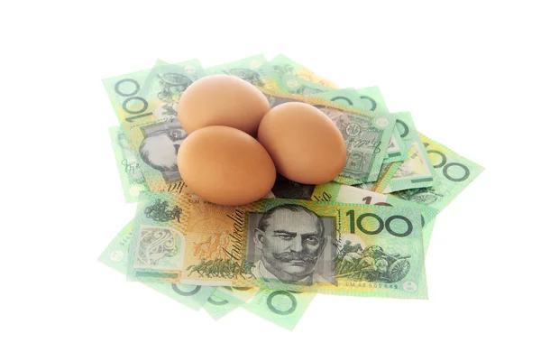 Chicken eggs on Australian Money — Stock Photo, Image