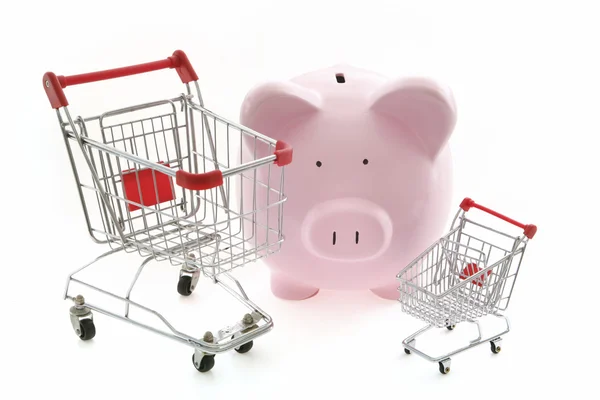 Piggy Bank and shopping car — Stockfoto