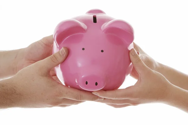 Piggy Bank in menselijke handen — Stockfoto