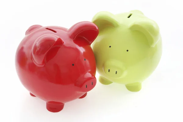 Piggy banks op wit — Stockfoto