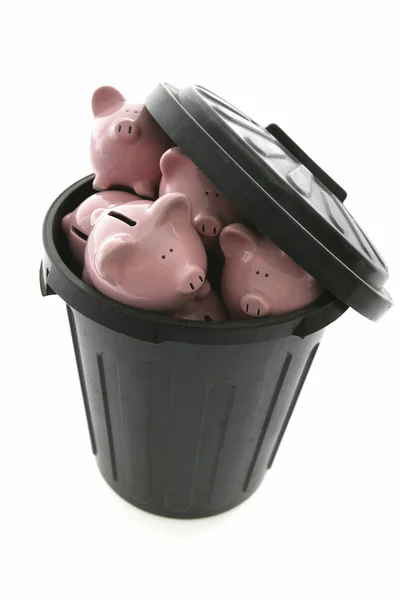 Piggy Banks in trash can — Stock Photo, Image