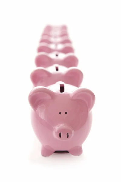 Piggy banks op wit — Stockfoto