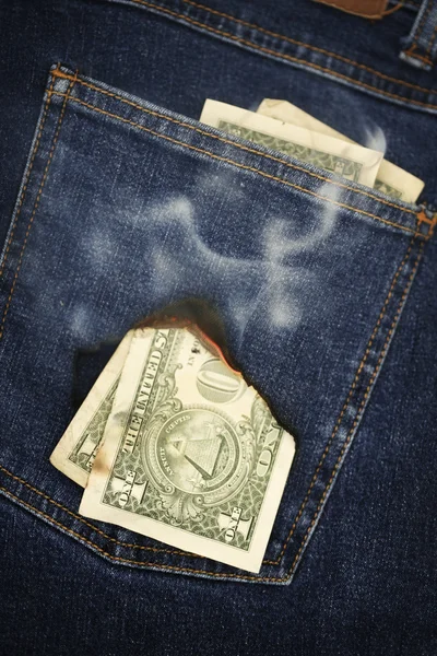 Money burning a hole — Stock Photo, Image