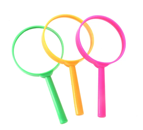 Colored magnifying glasses Stock Picture