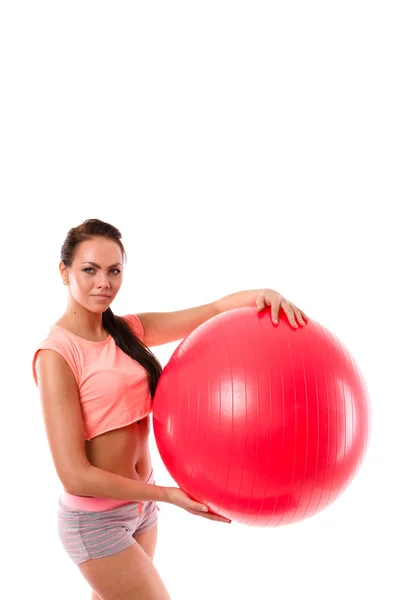 Ragazza tenendo fitball verticale — Foto Stock