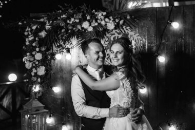 newlyweds at a wedding in the corridor of sparklers