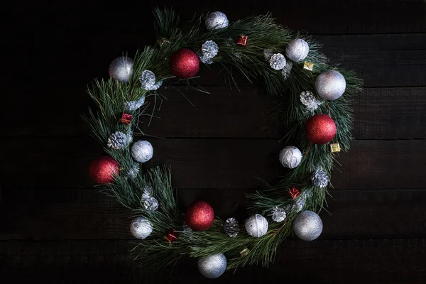 Christmas wreath of fir branches with Christmas decorations — Stock Photo, Image